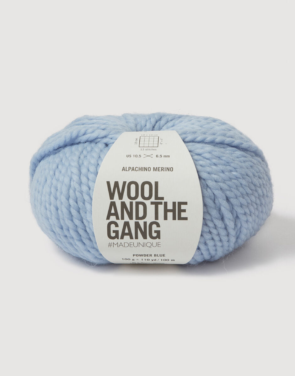 Alpachino Merino, Light blue yarn ball with 'Wool and the Gang' label on a white background