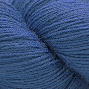 Close-up of blue yarn with a focus on texture