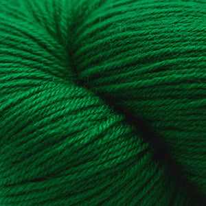 Close-up of green yarn with a focus on texture and color.